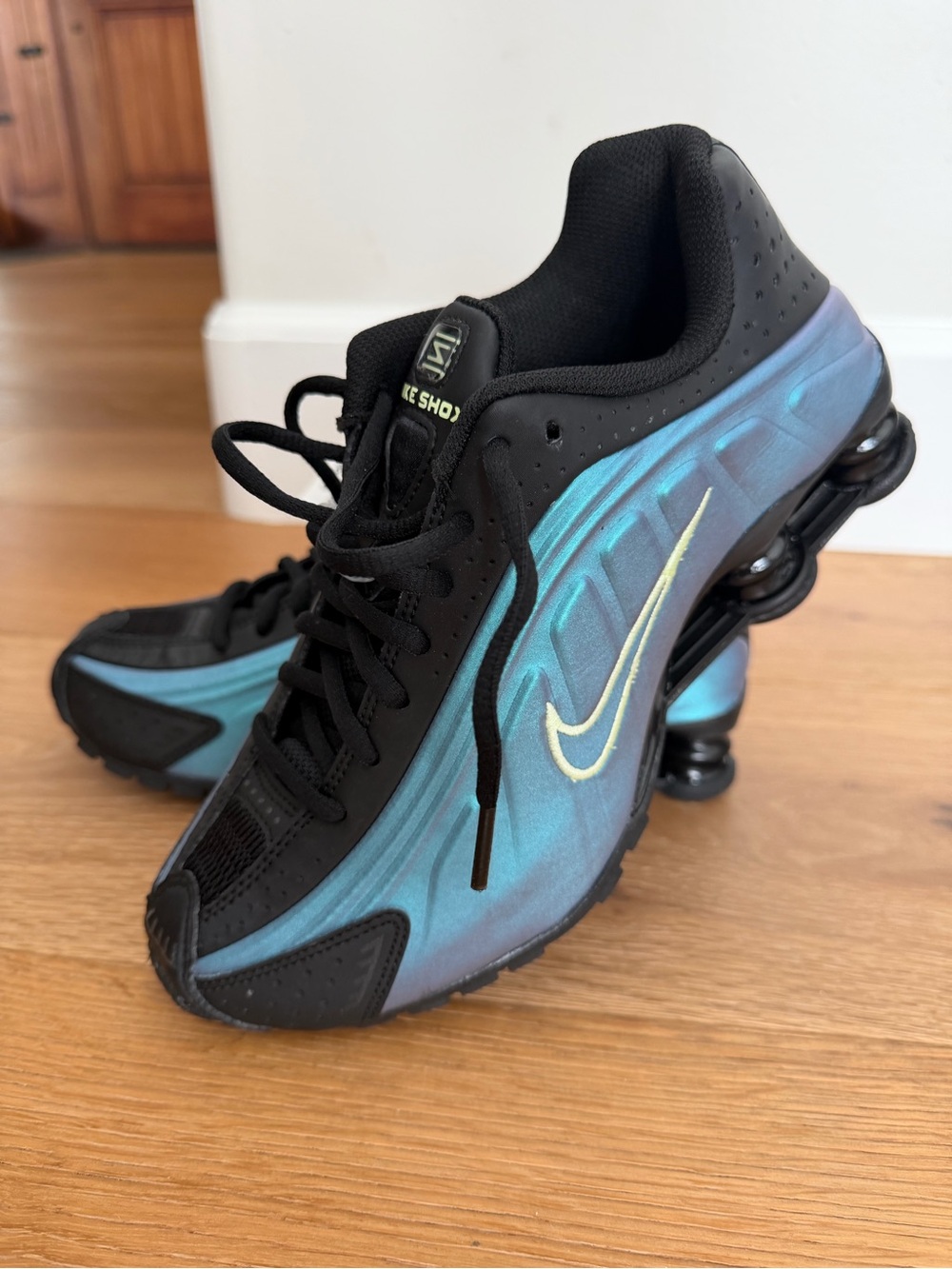 Nike Women’s Black and Iridescent Teal Shox Sneakers